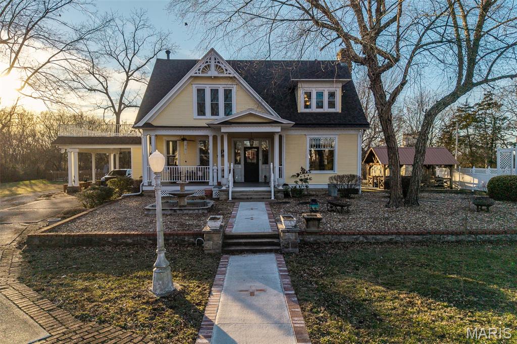 A rare opportunity to own a historic home in the Lebanon area offering over 3,500 sq. ft. of living space, featuring 4 bedrooms and 3.5 baths. Beautifully situated on approximately 5 picturesque acres, this property is rich in character and timeless charm. Outdoor amenities include a pool with separate pool house, detached garage, mature fruit trees, the original ice house, and a charming doll house/playhouse. A peaceful pond provides the perfect spot for fishing or quiet relaxation. The expansive additional acreage offers potential for future development or expansion, subject to zoning and approvals. This one-of-a-kind property blends history, privacy, and opportunity—just minutes from town.  Can be bought with 20 Acres see Listing MLS #26001390
