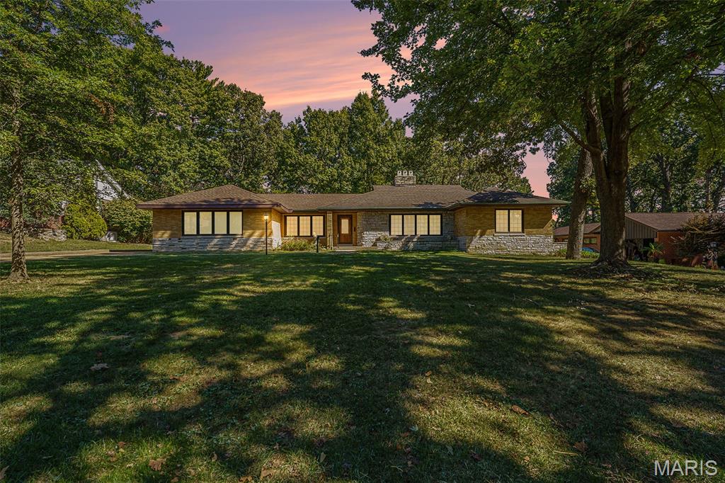 Welcome to 7369 Whitehaven Drive, nestled in the highly sought-after Forest Haven subdivision in Grantwood Village—one of South County’s most desirable neighborhoods. Located within the award-winning Lindbergh School District, this home offers a rare blend of charm, space, and an unbeatable setting.

Set on an expansive half-acre lot, the property is surrounded by breathtaking, centuries-old oak trees that create a picturesque and serene environment you simply won’t find just anywhere. Forest Haven is known for its natural beauty and unique character, and this home is no exception. Even more special, the subdivision offers direct walking access to Grant’s Farm—an incredible feature that adds both convenience and a touch of local history to your everyday lifestyle.

Inside, you’ll find beautiful woodwork that adds warmth and timeless appeal throughout the home. The layout provides comfortable living spaces with plenty of opportunity to make it your own. Downstairs, a private sauna offers a relaxing retreat—perfect for unwinding at the end of the day.

Additional highlights include a spacious detached two-car garage, offering both functionality and extra storage, as well as the privacy and room to enjoy outdoor living on your generous lot.

This is more than just a home—it’s an opportunity to live in a truly special community with character, charm, and unmatched surroundings. Don’t miss your chance to own a piece of Forest Haven.