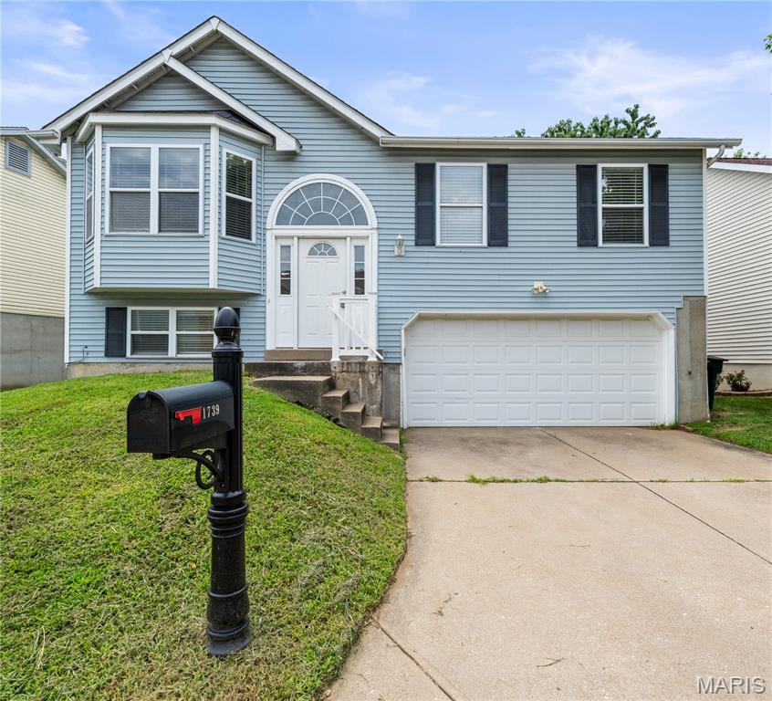 Welcome home to this spacious 4-bedroom, 3-full-bath split-level home located in the desirable Prospect Point #2 neighborhood within the highly sought-after Francis Howell School District! This thoughtfully designed floor plan offers a comfortable blend of open living spaces and private retreats. The main level features vaulted ceilings, a large bay window that fills the living room with natural light, and updated LVP flooring throughout the main living areas. The inviting kitchen offers updated matching appliances, ample cabinet space, and an open connection to the dining area—perfect for everyday living and entertaining. Step outside onto the back deck and enjoy a great space for relaxing or hosting gatherings. The primary bedroom features abundant natural light and a private full bath, while the finished lower level provides additional living space with a family room, fourth bedroom, and another full bathroom. An oversized two-car garage offers convenience and extra storage. Enjoy the added benefit of neighborhood amenities, including access to the community pool. Don't miss your opportunity to call this wonderful property home!