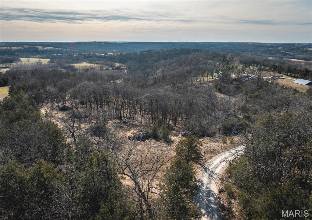 Discover the perfect blend of privacy and scenery on this stunning 9-acre parcel in Loose Creek, MO. Featuring an excellent building site, this property boasts a phenomenal, elevated view of the Maries River Bottom that must be seen to be appreciated. Enjoy peaceful rural living with abundant wildlife, open space, and stunning panoramic views. Utilities nearby and easy access make this a rare opportunity to own a prime piece of land in a highly desirable area. Imagine morning coffee overlooking the river valley and evenings surrounded by quiet country beauty. Ideal for a custom home, recreational getaway, or future investment.