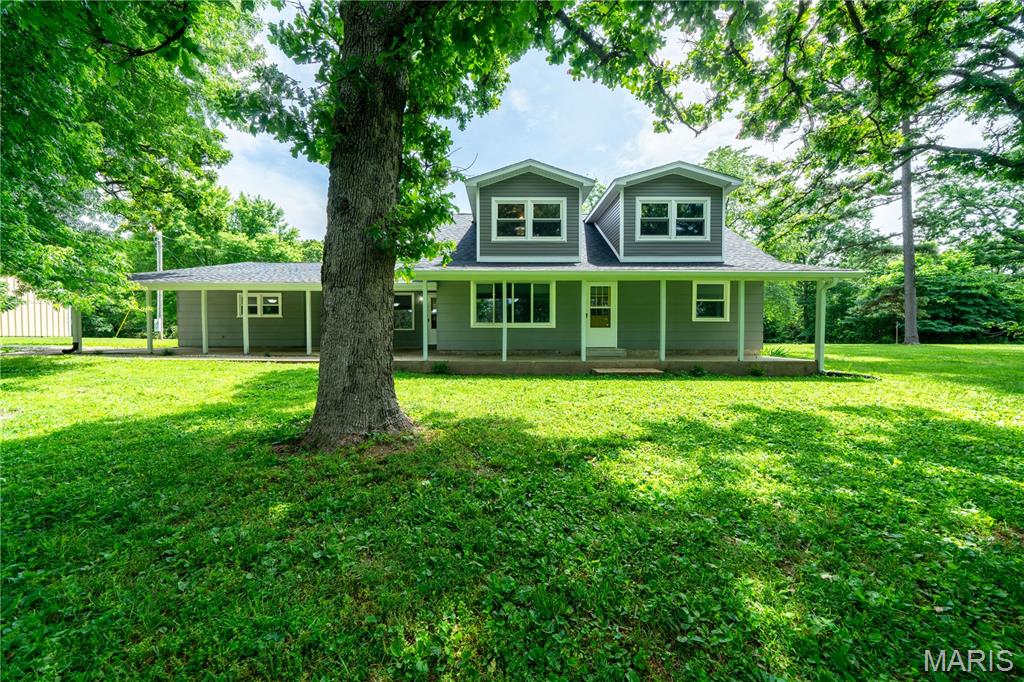 Tucked away on 10.4 picturesque acres just 5 minutes outside the Rolla area, this spacious property offers the perfect blend of privacy, comfort, and country living. With nearly 3,500 square feet of living space, this 5-bedroom, 3-bath home provides room for everyone while still delivering the peaceful setting you’ve been searching for.

A blacktop road leads all the way to the driveway, welcoming you to a property filled with mature trees, abundant wildlife, and a beautiful pond that creates the ideal backdrop for relaxing evenings or outdoor adventures. Inside, you’ll find numerous updates throughout, including a remodeled kitchen featuring a stunning quartz island, newer appliances, fresh exterior paint, newer HVAC heat pump, and a new roof and gutters for added peace of mind. A cozy wood-burning stove adds warmth and charm to the home’s inviting atmosphere.

Outside, the 24x40 shop with concrete floors and two roller doors offers incredible space for hobbies, equipment, storage, or a workshop setup. Whether you’re looking for room to spread out, enjoy nature, or simply escape the hustle while staying conveniently close to town, this property truly checks all the boxes.