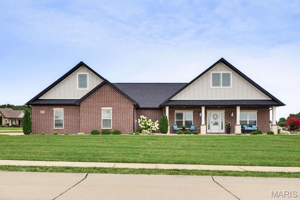 Beautiful Custom Design home with Upscale quality finishes: Oversized Three Car Garage. Big front porch and Big Screened -in back porch with patio. Kitchen has custom Beussink shaker cabinets, kitchen Aid appliances, a ten foot island, and Quartz counter tops. There is a custom wooden hood over the stove. Walk in Butlers Pantry. Kitchen and Great Room are very open and great for entertaining. Dining Room is separate. Primary bedroom is very spacious with a huge walk-in closet that is also a Safe Room. Primary bathroom has a tile shower and separate tub. The back hallway has built in cubbies. The yard has been professionally landscaped.