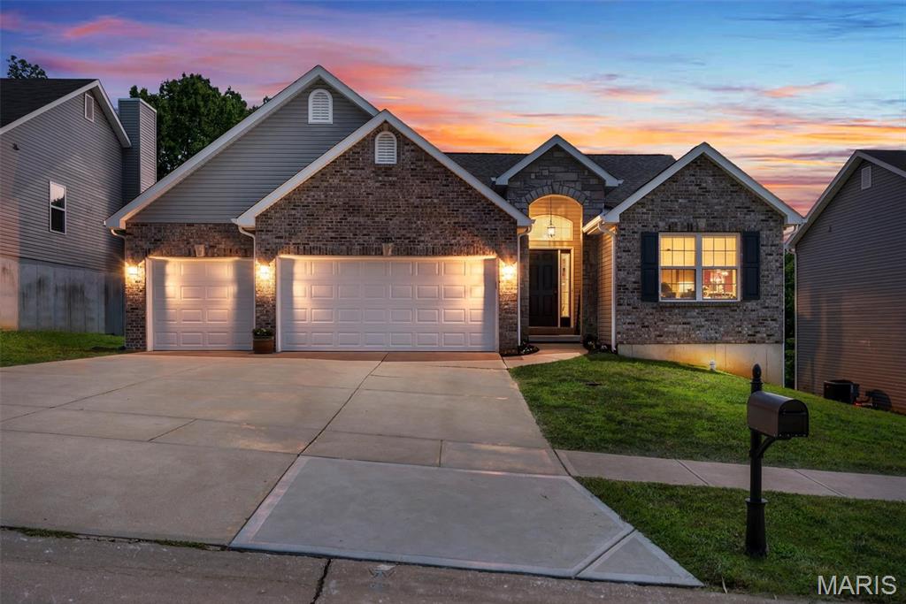Every buyer starts with a list.

Maybe it's a three-car garage. A quiet cul-de-sac. A finished walkout basement. A wooded backyard. Over time, though, the search becomes less about checking boxes and more about finding a place that simply feels right.

I think this is one of those homes.

Nestled in a small cul-de-sac community and backing to mature woods, this home offers more than 2,800 finished square feet of spaces designed to be lived in and enjoyed. The timeless brick facade, stone arched entry, transom window, and welcoming curb appeal are just the beginning.

Inside, you'll notice the choices that were made from the very beginning. Numerous upgrades, thoughtful extensions, and bay windows create a home that feels open, comfortable, and filled with natural light. Hardwood floors carry through the foyer, dining room, and kitchen, while the vaulted great room, complete with custom built-in bookcases, creates a place where family naturally gathers. Wired with Cat 6 networking, the home is equally prepared for today's connected lifestyle, whether you're working from home, streaming, gaming, or managing smart home technology.

The kitchen is exactly where you'll want to spend time, featuring shaker-style cabinetry with crown molding, KitchenAid appliances, a breakfast bar, and generous workspace that makes everything from busy mornings to holiday gatherings feel effortless.

At the end of the day, the primary suite becomes your place to recharge. The coffered ceiling and bay window create a peaceful retreat, while the luxurious bath offers a jetted soaking tub, separate shower, and double-bowl adult-height vanity.

The finished walkout lower level offers even more flexibility with a fourth bedroom, full bath, a spacious recreation area, and an additional finished room that could serve beautifully as a home office, hobby room, workout space, or guest retreat.

Finding a home is rarely just about square footage or finishes. It's about the feeling you get when you walk through the front door and begin imagining birthdays, quiet mornings, holiday traditions, and the life you'll build there. If you've been waiting for a home that feels as welcoming as it is beautiful, your search may have just come to an end.