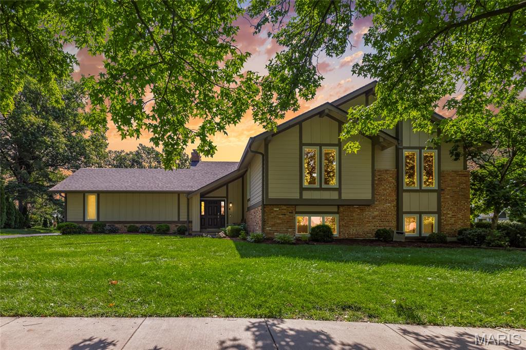Open Sat, 7/11, 12-2pm. Tucked away on a picturesque cul-de-sac in the highly sought-after Scarborough subdivision, this exceptional residence combines timeless elegance with modern updates in the award-winning Parkway School District. Rich hardwood flooring flows throughout the main living areas, creating a warm and sophisticated backdrop for everyday living and entertaining.

The beautifully renovated kitchen serves as the heart of the home, showcasing crisp white custom cabinetry, stunning matte granite countertops, stainless steel appliances, double wall ovens, a microwave drawer, gas cooktop, recessed lighting, and a sunlit breakfast area with seamless access to the expansive rear deck. The formal dining room is enhanced by a custom bowed window framing serene backyard views, while the adjoining family room features oversized windows that flood the space with natural light and bring the outdoors in.

The main level offers three generously sized bedrooms, including a luxurious primary retreat with a beautifully updated spa-inspired bath. An updated hall bath and new carpeting throughout all bedrooms (2026) further elevate the home's appeal.

Designed for both relaxation and entertaining, the finished walk-out lower level offers an impressive extension of living space. Highlights include a spacious second family room with fireplace and recessed lighting, two additional bedrooms, and a full bath—ideal for guests, extended family, or private work-from-home accommodations. Surrounded by mature landscaping and situated in one of Chesterfield's most desirable neighborhoods, this residence offers the perfect blend of comfort, sophistication, and location.