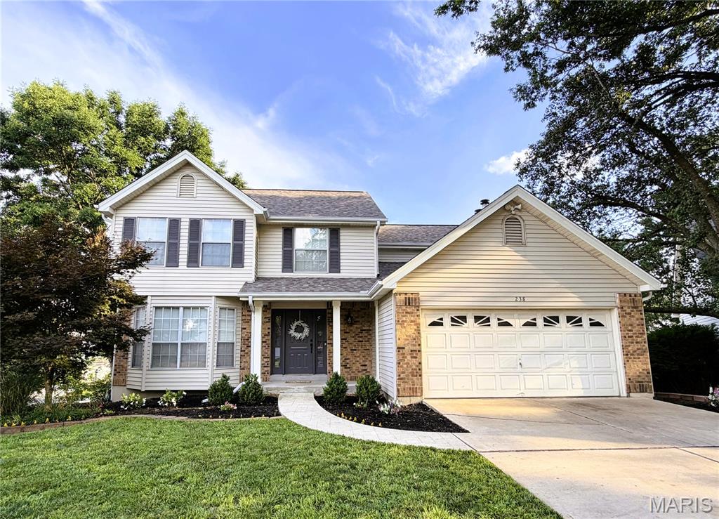 Welcome to 238 Westridge Parc Lane, a spacious 4-bedroom, 2.5-bath home nestled in the desirable Westridge Parc neighborhood and served by the award-winning Rockwood School District. Offering nearly 2,000 square feet above grade plus a partially finished walkout lower level, this home provides the perfect blend of comfortable living, functional space, and outdoor enjoyment.

Step inside to find inviting living and dining spaces, a warm and welcoming family room with fireplace, and a thoughtfully designed floor plan ideal for both everyday living and entertaining. The kitchen opens to the breakfast area and overlooks the backyard, creating a bright and connected gathering space.

Upstairs, you'll find four generously sized bedrooms, including a spacious primary suite with an en-suite bath and ample closet space. The partially finished walkout lower level offers flexible living space perfect for a recreation room, home office, workout area, or playroom, with additional unfinished space for storage.

Outdoor living is a true highlight of this home. Enjoy morning coffee or evening gatherings on the large low-maintenance composite deck overlooking the backyard. The walkout lower level provides easy access to the yard, while the lot offers added privacy with no homes directly behind.

Major updates provide peace of mind, including a newer roof and HVAC system, allowing the next owner to focus on making the home their own. Conveniently located near parks, shopping, restaurants, and everyday conveniences, this home offers exceptional value in one of Ellisville's most sought-after neighborhoods.