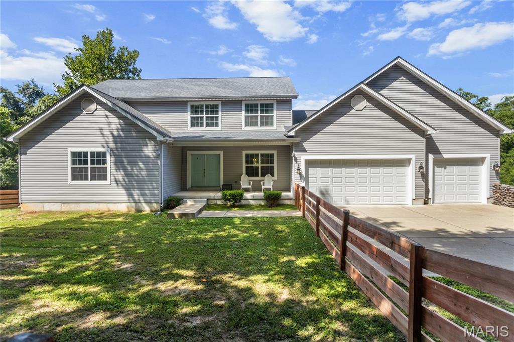 Secluded Wildwood Retreat on Private Driveway with Geothermal Efficiency!

Welcome to 531 Strecker Road in Wildwood, a beautiful one-owner home built in 2017 offering the perfect combination of privacy, modern amenities, and energy efficiency. Tucked away on a private, secluded driveway, this home provides a peaceful retreat while still being conveniently located near shopping, dining, parks, and all that Wildwood has to offer.

Step inside to a bright and inviting open-concept floor plan featuring expansive windows that fill the home with natural light. The spacious main-level primary suite offers a relaxing retreat with a luxurious ensuite bathroom complete with a soaking tub, separate shower, and large walk-in closet.

The heart of the home is the well-appointed kitchen featuring stainless steel appliances, ample cabinetry, and an open view of the dining and living areas—perfect for entertaining family and friends. Step outside from the kitchen onto the inviting back deck, ideal for morning coffee or enjoying the peaceful backyard setting.

Additional features include an oversized main-floor mudroom, two spacious upstairs bedrooms, a full bathroom, and a versatile loft area complete with a built-in projector and screen, creating the perfect space for movie nights, gaming, or relaxing with family.

The unfinished walk-out basement offers endless possibilities for additional living space, a recreation area, home gym, or workshop. Outside, enjoy a charming fenced front yard with a beautiful wood fence and a private backyard surrounded by nature.

Energy efficiency is a standout feature with the geothermal heating and cooling system, providing year-round comfort, reduced energy costs, and environmentally friendly operation.

Property Highlights:

One-owner home built in 2017
Private, secluded driveway setting
Main-level primary suite
Primary bath with soaking tub, separate shower & walk-in closet
Open-concept living spaces with abundant natural light
Stainless steel kitchen appliances
Oversized main-floor mudroom
Upstairs loft with built-in projector and screen
Two additional spacious bedrooms upstairs
Unfinished walk-out basement
Back deck overlooking the backyard
Fenced front yard with beautiful wood fencing
Geothermal HVAC system for energy efficiency
A rare opportunity to own a newer Wildwood home offering privacy, modern comfort, and thoughtful features in a serene setting.