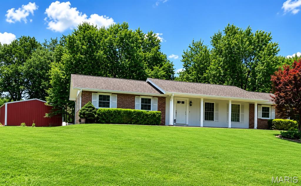 Awesome 3 bed, 2 bath home in R7 school dist that sits on 1.77 acres with a brand new septic installed in 2025, HVAC approx 2 years old and roof  and windows replaced approx 9 years ago.  all wood floors throughout except kitchen and bath.  You will love  the  freshly painted Sunroom immediately off of kitchen to enjoy your morning coffee.  Basement offers large family room and 2 more rooms that would make perfect game room or work area.  There is another detached 16 by 24 garage as well as a 30 by 50 pole barn for all your toys, as well as an old barn .  Dont let this one get away .  Professional pictures coming soon.