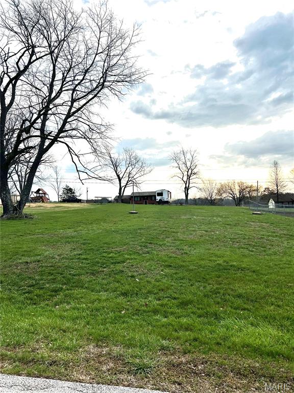 Use the address 4262 REDWOOD LANE as a locator; the lot is to the left of this property.A great opportunity to build your own home on the gorgeous level lot. Utilities are on the street. Mobile homes are not allowed; the minimum requirements for a home must be at least 1000 square feet. Pick your builder and make your American Dream come true!