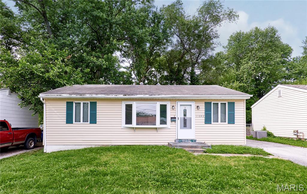 Welcome to this well-maintained 3-bedroom ranch offering comfortable living in a convenient Saint Ann location. The bright, open main living area features beautiful updated flooring and plenty of natural light, creating a warm and inviting atmosphere. The updated kitchen is highlighted by custom cabinetry, generous storage, and a functional design that makes meal preparation easy and efficient. Providing both style and functionality. Three spacious bedrooms and a full bath complete the main level. The finished basement provides valuable additional living space, featuring a spacious recreation room and a separate sleeping area. Outside, enjoy a fully fenced backyard, perfect for BBQ's with friends and family! This move-in-ready home offers excellent value and everyday convenience. Hurry and book your showing today!