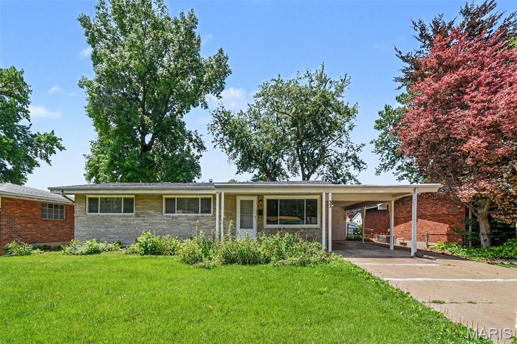 Welcome to this inviting 3-bedroom, 1.5-bathroom home perfectly situated in the neighborhood of Hazelwood!

Inside, the open floorplan provides a seamless flow for comfortable living and entertaining. The living room is anchored by a cozy fireplace, while the open-concept kitchen boasts elegant granite countertops and updated stainless steel appliances. Step outside to enjoy a private, fully fenced-in backyard that offers a great space for outdoor relaxation.

Ideally located near City Hall, local shopping, and restaurants, this home makes commuting simple and convenient with close proximity to Highway 270, Lambert Airport, and UMSL.

Schedule your private showing today!