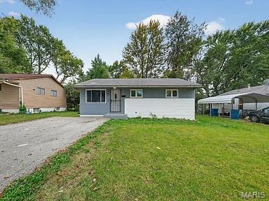 ATTENTION HOMEBUYERS & INVESTORS! Turnkey and beautifully updated, this 3-bed, 1-bath  home in Glasgow Village offers the perfect blend of modern upgrades and high yield rent potential. Whether you are looking for a move-in-ready residence or a stress free addition to your rental portfolio (Section 8 welcome!), this property checks every box. Step inside to a bright, open concept layout featuring brand new flooring throughout the entire main level and fresh paint. The spacious kitchen has been completely revitalized with new countertops, a stylish new backsplash, and ample cabinet space; perfect for home cooked meals or maximizing rental appeal. The bathroom has also been refreshed with a brand new vanity and toilet. Additional highlights include a revamped lounge like sunroom perfect for morning coffee, a massive backyard, a concrete patio, and convenient off-street parking. Head downstairs to find an excellent bonus storage space featuring durable, newly epoxied basement floors. With rental demand high in 63137, strong market numbers, and all major cosmetic updates already done for you, this gem won’t last long. The property comes with a passed occupancy which means this is ready to market on day one! The owner has two other properties in the area that are available for purchase. Schedule your showing today!