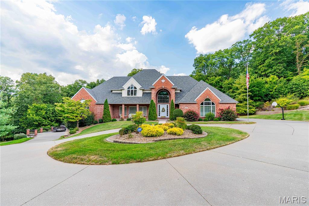 Spectacular Home in Northfield Subdivision!
Nestled at the end of a quiet cul-de-sac, this stunning home sits on a beautiful lot that truly feels like your own private oasis! Step through the front door into a grand entryway with wood floors that lead into a gorgeous living room featuring a gas fireplace and custom built-ins. The kitchen is a showstopper with stainless steel appliances, granite countertops, and a custom-built granite table seamlessly attached to the counter. The adjoining dining room offers a charming bay window with built-in granite seating—perfect for family meals or entertaining guests. The primary suite is a dream, complete with Corian countertops, a walk-in shower, and private access to the screened-in porch. Enjoy your morning coffee or unwind in the hot tub while taking in the peaceful views of your backyard retreat. Upstairs, you’ll find three additional bedrooms, one perfectly suited for a home office. The lower level is designed for fun and relaxation, featuring a spacious family room with a gas fireplace, a game room, a large bar area, your own private gym, plus another bedroom and full bath. Step outside and experience resort-style living with a private in-ground pool surrounded by lush landscaping and a waterfall feature. The outdoor kitchen is fully equipped with a grill, refrigerator, microwave, plenty of cabinets, eat at bar, ceiling fans, and stereo system—ideal for summer gatherings! Car enthusiasts and hobbyists will love the abundance of garage space—with a 3-car garage on the main level, a 2-car garage on the lower level, and extra storage off the side driveway for boats, side-by-sides, or other toys. Don’t miss the chance to own this one-of-a-kind home—schedule your showing today!