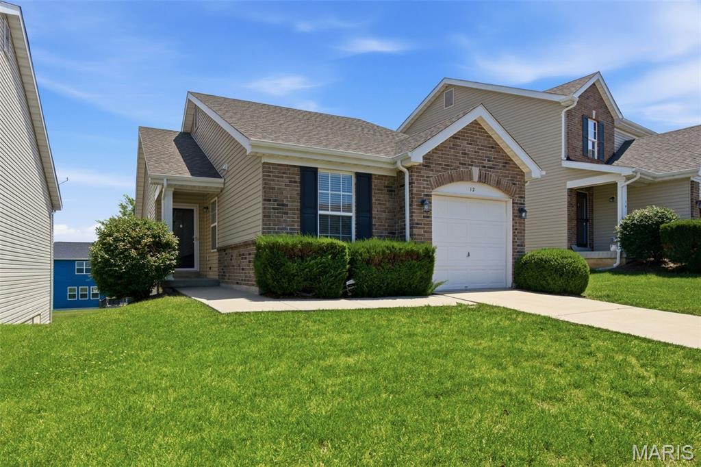 Location, Location, Location! Conveniently located just minutes from Hwy 70, this rare brick-front ranch is tucked away on a cul-de-sac. Relax on the inviting covered front porch and step inside to discover a cute and cozy open floor plan featuring 2 bedrooms, 1.5 baths, and convenient main-floor laundry.

The walk-out lower level is mostly framed and ready for your personal touch, offering the potential to easily add a spacious family or recreation room, a third bedroom, and an additional bathroom with existing rough-in plumbing.

Located in the highly sought-after Wentzville School District, this community offers fantastic amenities including a subdivision pool, playgrounds, pavilion, and walking trails.

Affordable, move-in ready, and full of potential—this is one you won't want to miss!

Professional photos coming soon. Showings begin Fri, 6/19.