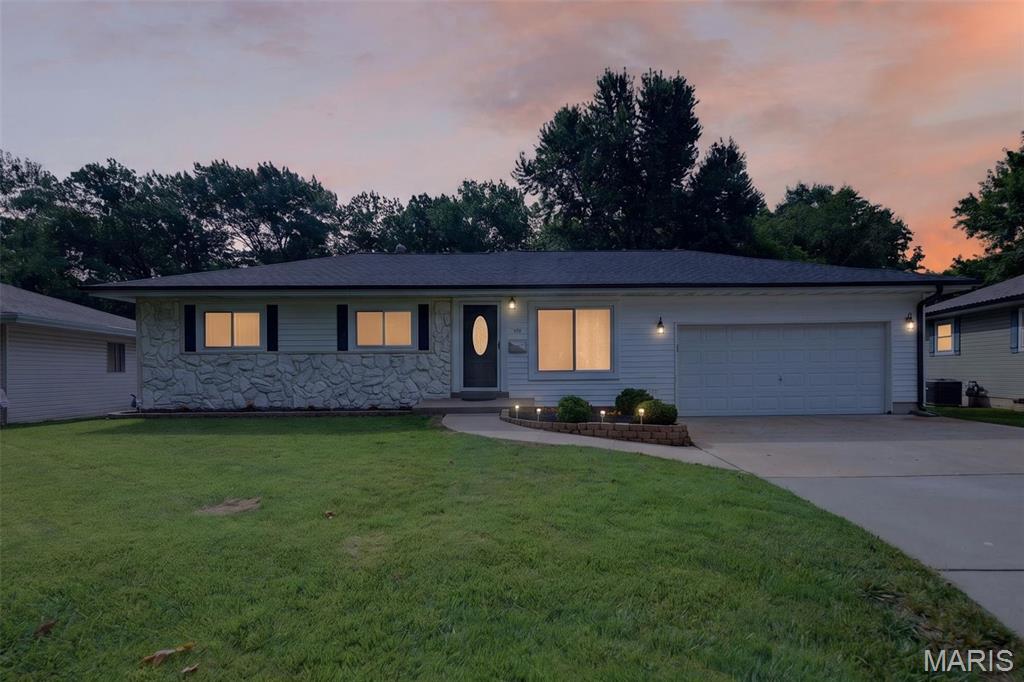 Here it is, the one you’ve been waiting for! Check out this incredible ranch tucked away perfectly in the heart of O’Fallon! From the moment you pull up, you’ll immediately fall in love. Notice the inviting, tasteful curb appeal as you walk in from the peacefully quiet street. When you step inside, prepare to be immersed in feelings of comfort and excitement. Every inch of this home has been thoughtfully designed; flush with spectacular new LVP flooring, fresh paint throughout the house, and elegant kitchen upgrades (look at those gorgeous quartz countertops and the stunning fireclay sink!). This home is the definition of move-in ready – you won’t have to do a thing! Even the finished basement provides an awesome combination of generous lounging space, a bonus room (office/home gym), and a beautiful full bathroom. But that’s not even the best part – check out that amazing backyard! Imagine entertaining friends and family under that huge, covered patio while enjoying the expansive backyard that backs to trees and tranquility. Ready to enjoy cool fall nights at your outdoor oasis? With the built-in firepit, you’re all set! Oversized two-car garage has both front and rear garage doors, which provides incredible functionality. Rest easy knowing this house just got a new roof in 2025 (comes with a transferrable warranty). Location is everything - this house provides such easy access to I-70 and Highway K, making it a quick drive to anywhere you want to go in St. Charles County and beyond. Everything about this house is telling you that it needs to be your next home. Don’t miss out on this fantastic opportunity!