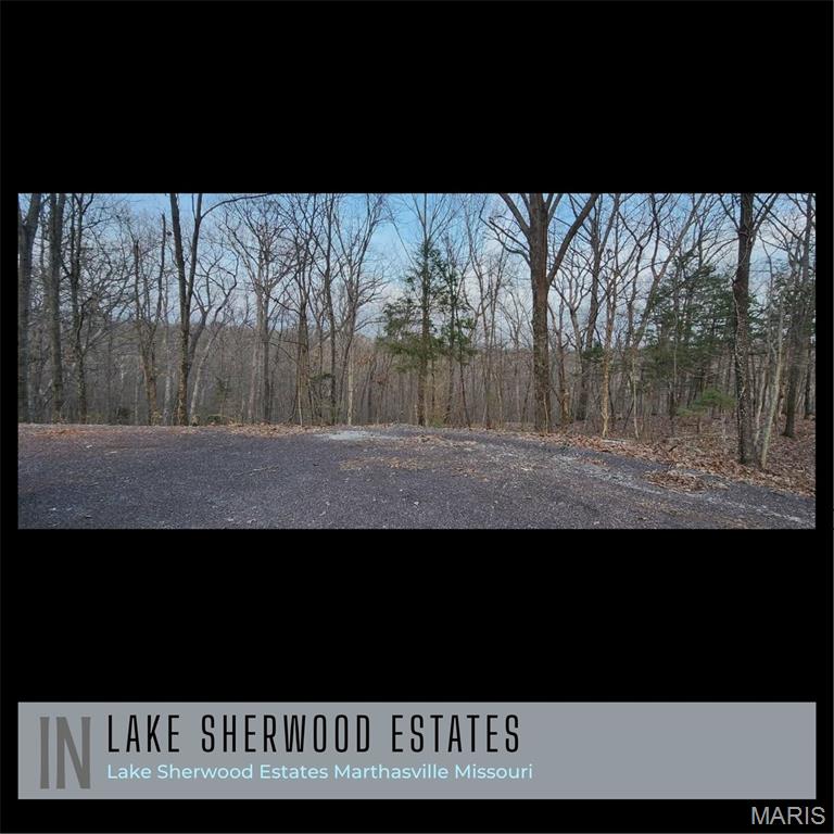 Discover the perfect opportunity to own a beautiful vacant lot located at 2422 Lancers Ct. Nestled on a quiet cul-de-sac, this property offers privacy and peaceful surroundings while backing directly to common ground for added space and natural views. Enjoy breathtaking sunsets right from your future front yard—an ideal setting for relaxing evenings and entertaining. The lot is in its natural state, giving you the flexibility to design and build exactly what you envision—or simply hold as an investment, as there is no requirement to build. Utilities are conveniently available at the road, including water, sewer, and electric, making this a ready-to-go opportunity whenever you decide to build. Located within the sought-after 24-hr gated Lake Sherwood community, you’ll have access to incredible amenities including lake access, boating, fishing, beaches, community center, beach, lakeside grill, campgrounds, lakeside pavilions a marina. 6 lakes from 3 acres to 130 acres offers great fishing. In Washington School District minutes from beautiful downtown Marthasville. 35-min drive from Chesterfield and located minutes to Missouri’s finest wineries. This lot will not disappoint. Set up your appointment today! So, whether you're ready to build now or planning for the future, this lot offers flexibility, privacy, and a fantastic location. Come on out and see what LAKE LIFE IS ALL ABOUT!