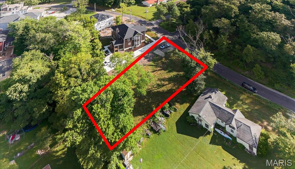 FABULOUS opportunity to build your dream home on 0.28 acre lot in highly sought-after AAA Rockwood School District- Truly a RARE FIND! Located in the heart of Ballwin- you will appreciate the quiet location & a LEVEL lot framed by plenty of mature trees. So many opportunities! All structures have been razed. Site is served by all public utilities. Conveniently located near shopping, restaurants, and Castlewood Park. Don't miss out!