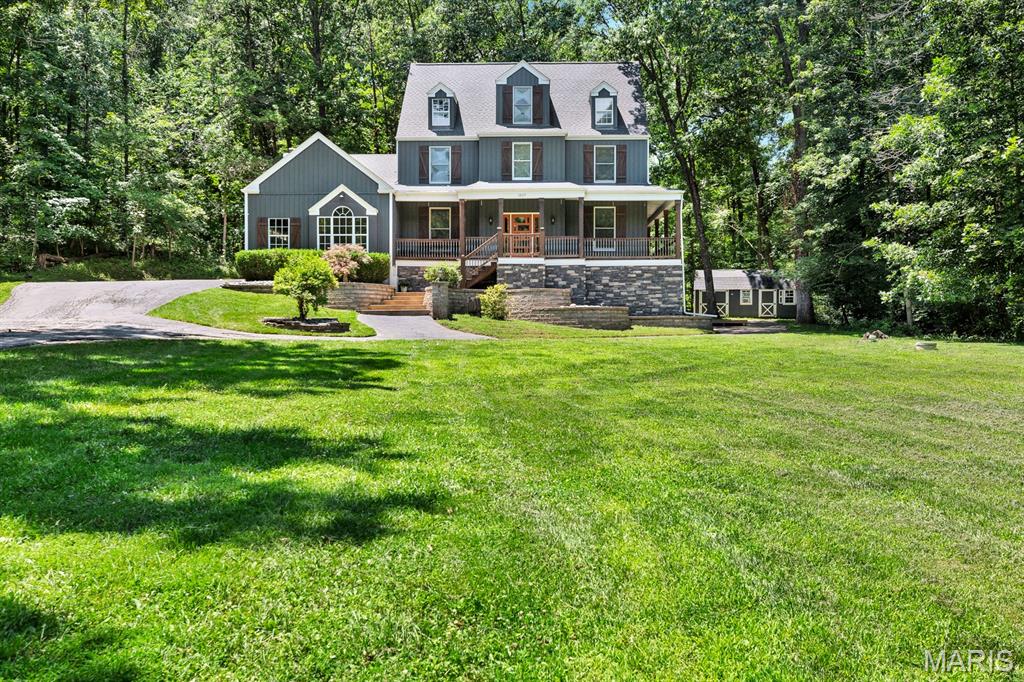 Set on over 3-acres in sought after Wildwood and the award winning Rockwood School District, this stunning 3 story home offers 4 bedrooms, 5.5 baths, and an impressive list of recent upgrades. Beautiful finishes flow throughout the spacious layout, complemented by a warm fireplace, a serene screened in back porch, and a dedicated office space ideal for today’s lifestyle. Outside, a custom outdoor fireplace creates the perfect setting for evening gatherings. A rare combination of privacy, space, and modern comfort in one of the area’s most desirable locations.