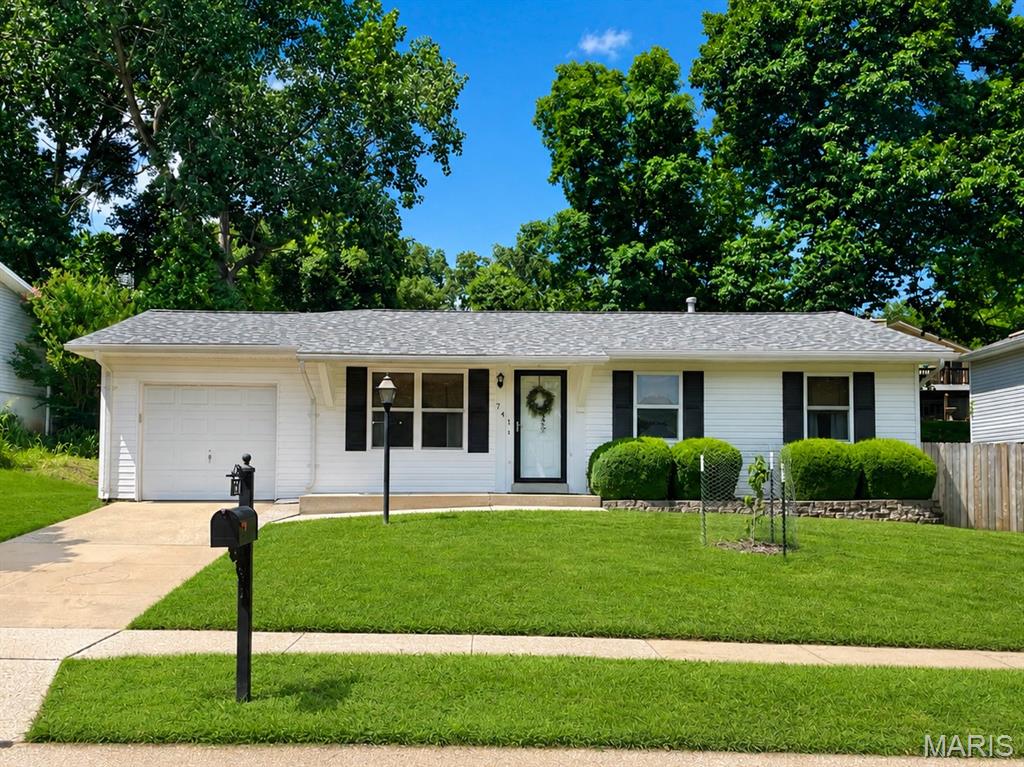 Welcome home to your charming and well maintained 3-bedroom, 2-bath ranch offering 1,500 square feet of comfortable living space in the heart of Valley Park! Step inside to a cozy living room with generous natural light and flow into the kitchen with an abundance of cabinets (refrigerator stays). The kitchen opens up to a spacious family room featuring a vaulted ceiling that creates an open, airy feel perfect for relaxing or entertaining. The dining space is conveniently located off the kitchen and includes counter seating and doors to the patio. The fireplace was serviced about 6 months ago, HVAC and water heater are about 7-8 years old. Roof was replaced in 2024. Washer and dryer are included. The basement is ready for your finishing and includes storage shelving and workbench. 

Outside, enjoy a private, fully fenced backyard—ideal for pets, play, gardening, or hosting summer barbecues. A 1-car attached garage provides convenient parking and additional storage.

Located in a desirable neighborhood with easy access to major highways, shopping, dining, parks, and the award-winning Valley Park School District, this home offers the perfect combination of comfort, convenience, and value. Don't miss your opportunity to make 741 Tree Top Ridge Drive your next home!