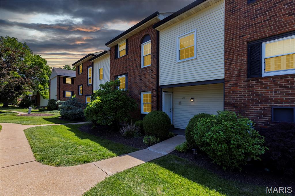 Townhome living with a little extra breathing room. This spacious 3-bedroom, 2 full bath, 2 half bath residence offers approximately 1,520sqft above grade plus a finished walkout lower level, creating over 2,000sqft of total living space in a convenient West County setting.

Designed for comfort, flexibility, and low-maintenance living, the floor plan offers multiple gathering areas, generous bedrooms, outdoor space on two levels, and a 1-car garage.

The main level features an inviting living room and dining area with great natural light and direct access to a private deck overlooking common ground, creating a peaceful spot for morning coffee, reading, or relaxing outdoors. The kitchen includes white cabinetry, good storage, and a functional layout with excellent potential for future personalization. A convenient powder room completes the main floor.

Upstairs, the primary suite includes its own full bath, while two additional bedrooms and a hall bath provide comfortable space for family, guests, or a home office.

The finished walkout lower level adds valuable versatility with a large family room, wet bar area, half bath, dedicated laundry room, storage, and access to a private patio framed by mature trees and a quiet, park-like backdrop. The patio also offers a great spot for outdoor seating and grilling.

Additional highlights include private deck and patio areas, generous storage, multiple living zones, and a smart layout that lives larger than expected. The community offers a pool, clubhouse, and attractive common grounds, all close to shopping, restaurants, parks, entertainment, major highways, and the highly regarded Parkway School District.

A strong opportunity for buyers seeking the space of a larger home with the ease of townhome living, community amenities, and a location that keeps everyday conveniences nearby.
