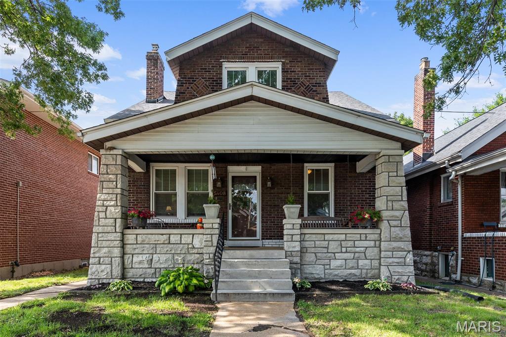 Pull up to 5408 Eichelberger and try not to squeal, “Look—a porch swing!” Honestly, you shouldn’t stop yourself. Whimsy, character, and charm abound in this spacious two-story Princeton Heights home. Step inside and you’re immediately greeted by beautifully preserved craftsman details—stained glass windows, rich wood trim and hardwood floors that carry throughout. The sunlit living room, anchored by a fireplace, flows effortlessly into a separate dining space, offering distinct rooms while maintaining an easy, open feel. The true showstopper? The chef’s kitchen. Thoughtfully renovated, it features stainless steel appliances, a center island, ample prep and storage space + room for everyone to gather—because let’s be honest, the party always ends up in the kitchen. Just down the hall, you’ll find a perfectly placed powder room and a versatile main-level bedroom—perfect for a cozy home office, art studio, or guest room. Upstairs, it's like Mary Poppins bag - you'll wonder "how there's so much room in this house?" The home continues to dazzle with tall ceilings, updated windows, and two generously sized bedrooms that can easily accommodate king-sized beds and additional furniture. Storage is a rare city luxury—and this home delivers, with multiple spacious closets in each bedroom, a large linen closet, and an additional walk-in off the landing. The lower level offers a partially finished space perfect for a home gym, studio, or flex area, along with ample additional storage. And the home system updates? Just as impressive—enjoy peace of mind with a new roof, new HVAC system, and a brand new sewer line running from the house to the city main. Outside, enjoy a level, fenced backyard ideal for pets or play, along with a garage and an additional two-car parking pad. And yes—the porch swing out front stays! All of this, just steps to the Macklind Strip, where local favorites, shops, and restaurants are right out your front door. Charming, functional, and full of personality—this is Princeton Heights at its best. Bring your favorite Realtor by for a private tour this week!