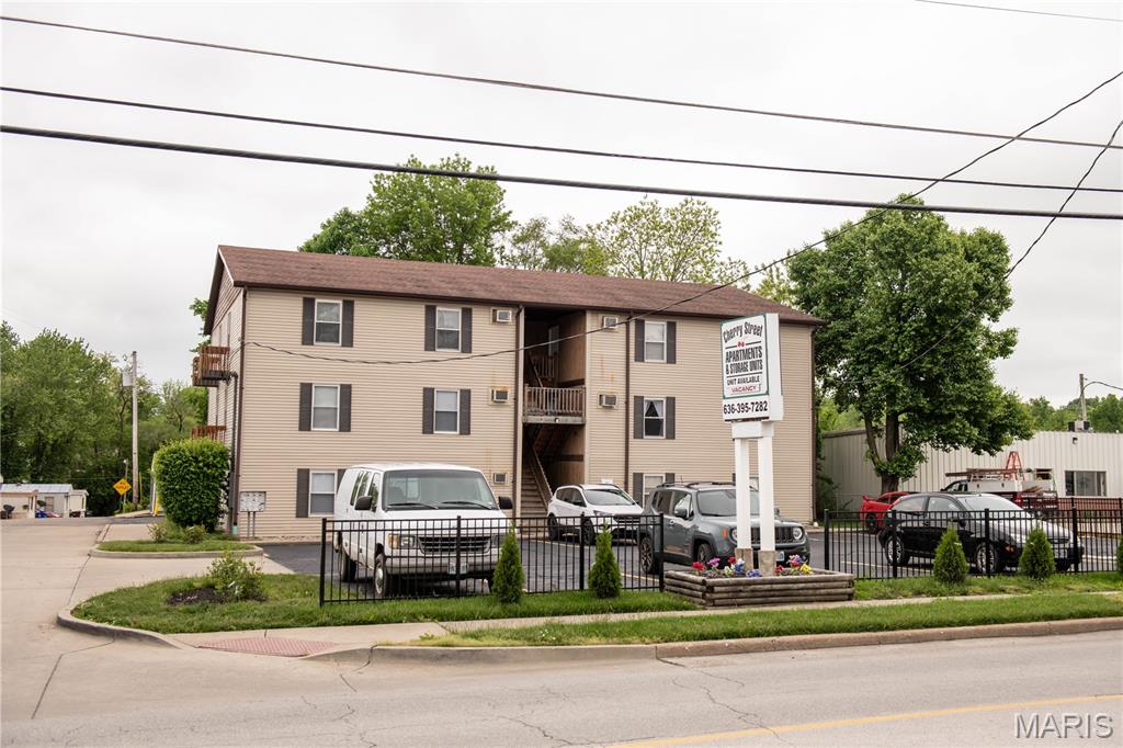 Excellent opportunity to acquire a high-occupancy 12-unit apartment complex with 12 additional on-site storage units in the rapidly growing Troy, Missouri market. Offered at $1,150,000, this stabilized investment features a mix of one-bedroom and two-bedroom apartments along with twelve storage units, providing diversified income and long-term upside.

Current gross rental income is $10,355 per month with market rent potential estimated at approximately $10,900 per month. Annual NOI is approximately $81,595, reflecting a 7.1% cap rate at the asking price. Most apartment units have already been renovated, minimizing immediate capital expenditures while leaving additional value-add potential through future rent increases and storage income optimization.

Investment Highlights:
• 12 Apartment Units
• 12 On-Site Storage Units
• High Occupancy
• Mix of 1-Bedroom & 2-Bedroom Units
• Most Units Renovated
• Current Gross Monthly Rent: $10,355
• Estimated Market Rent: $10,900+/Month
• Annual NOI: Approximately $81,595
• 7.1% Cap Rate at Asking Price
• Strong Workforce Housing Demand
• Limited Competing Apartment Inventory
• Located in One of Lincoln County's Fastest-Growing Markets

Current rent roll, T-12 financials, and additional income/expense information are available upon request. Property is being offered subject to interior inspection. To minimize disruption to tenants, interior showings will be scheduled following an accepted contract.
