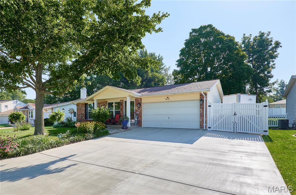 Pride of ownership shines in this meticulously maintained 3-bedroom, 3-bathroom home! Nestled in the award-winning Fort Zumwalt School District, this property is centrally located near premier shopping, dining, and major thoroughfares. From the curb, you’ll immediately notice the pristine yard and a gated, extended driveway perfect for trailer or RV parking. Step inside to an inviting, open-concept living area featuring gleaming flooring, solid-surface countertops, and convenient main-floor laundry. The main level hosts three spacious bedrooms—all equipped with ceiling fans—and two beautifully updated bathrooms. More space awaits downstairs: The finished lower level boasts a massive recreation and entertaining room, a third full bath, and two versatile sleeping rooms (perfect for guests, a home office, or a gym). Outdoor living at its best: Relax in the 3-season room situated just behind the extra-deep garage. Plus, a powered storage shed keeps your garage completely clutter-free. This turn-key gem truly has it all!