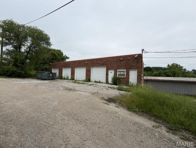 Come and see what this space can offer your business. Located close to I-55 and Imperial Main St. There are multiple spaces for different business opportunities. There are 2 buildings in total. The out-lot building has a tall drive in door with a split office and warehouse space, surrounded by ample parking and outside storage. The adjacent building is 2 story and can be used by multiple tenants. Both the 1st and 2nd floors have 4 drive in garage doors and ample warehouse space for working or storage. Both have a small office area built into the warehouse space with on suite bathrooms. Call today to set a showing!!!