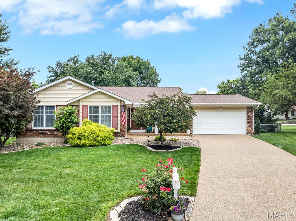 *********All offers due Saturday 6/27 by 7 PM ****
Located on a quiet cul-de-sac with a .42 acre level, fenced yard, mature trees, this updated Great Room Ranch features a rare FOUR Bedrooms on the Main level.  With 3000+ sq ft of total living space which includes the professionally finished basement, there's a place for everyone and great entertaining opportunities year round. Engineered Wood floors with 4" baseboards span the main level and Ceramic tile in 2 bathrooms.  Features include Anderson oversize double hung windows, Atrium door to patio, Bay window seat in Kitchen, white panel doors with bronze lever handles, skylights, vaulted ceiling, fan, wood burning fireplace, Crown molding in Dining Rm and Foyer. Kitchen has lots of natural light, white cabinets, quartz countertops, large single granite sink, stainless appliances and refrigerator which is included in sale. Take the Hardwood stairs down to a versatile Family Room with luxury vinyl plank floors, open floor plan, built-in entertainment center, seating area, rec and play areas all well-lit with dimmable LED lighting. There is a Flex/Bonus room/sleeping area, the 3rd full bath, and storage galore. Unfinished space has workshop, more storage and 50 gal water heater. An inviting and private back yard awaits with gazebo on one patio adjoining a 25 x 19 ft 2nd patio with privacy fence. A sun deck, 27 ft round pool, garden and shed, plus more yard space make this a "lets stay home" kind of place. Architectural roof, oversize downspouts, Archway pebble stone professional finished driveway, covered front porch and landscaping offer great curb appeal. Subdivision has 3 fishing lakes and low HOA fee. Easy access to 364/94, stores, dining and several parks.  AAA rated Francis Howell Schools. Home has been well maintained yet Seller offers a 1 year Choice Ultimate Warranty (includes pool) for Buyer's peace of mind.  Refrigerator, Pool table, wall mounted TVs will stay. Contact your Buyer's Agent to schedule a private showing