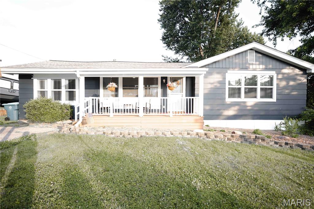 Welcome to 132 Kunze Drive. This well-maintained 2 bedroom 2 bathroom home offers an open floor plan, a spacious kitchen, and a partially finished basement on a generously sized lot in St. Charles.
The kitchen serves as the focal point of the home, featuring abundant cabinetry, ample counter space, and an oversized island with seating and storage. The adjoining dining area provides plenty of room for everyday living, gatherings, and entertaining.
The main level includes two bedrooms, a full bathroom, and comfortable living space with a functional layout designed for easy everyday living. 
The partially finished basement expands the home's usable space and includes an additional bathroom, offering flexibility for a recreation room, family room, home office, workout area, or hobby space. The lower level also provides valuable storage options. Outside, enjoy the covered front porch, mature trees, established landscaping, and spacious yard. The updated exterior adds curb appeal and creates a welcoming first impression.
Conveniently located near shopping, dining, parks, schools, and major commuter routes, 132 Kunze Drive offers a combination of practical living space, recent updates, in a desirable St. Charles location.