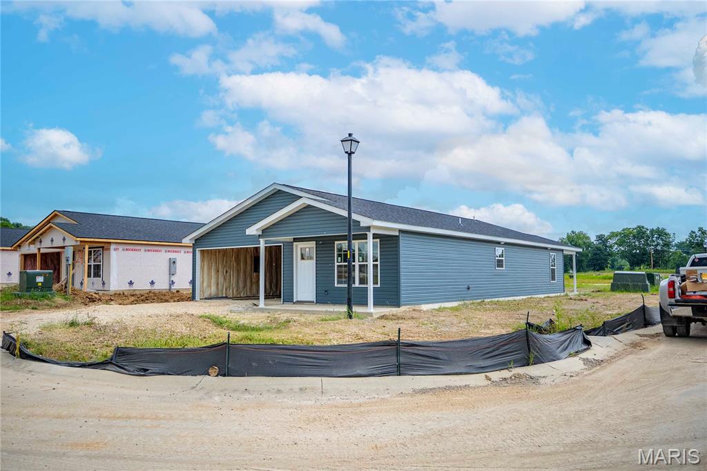 Welcome home to this beautiful new construction in the desirable Kings Landing subdivision! Situated on a spacious corner lot just outside the city limits, you’ll enjoy the convenience of being only minutes from everything Cape Girardeau has to offer.

Step inside to discover 1,384 square feet of thoughtfully designed, all-level living featuring 9-foot ceilings, an open-concept floor plan, and abundant natural light. The kitchen is complete with quartz countertops, appliances, and plenty of cabinet space, making it perfect for both everyday living and entertaining.

The split-bedroom layout offers 3 bedrooms and 2 full bathrooms, including a private primary suite designed for comfort and functionality with its own full bathroom and walk-in closet. A 2-car attached garage adds extra convenience and storage.

Location is everything, and this home delivers. You’re less than 5 minutes from historic downtown Cape Girardeau, the casino, shopping, dining, and entertainment, while major employers like Procter & Gamble and Mondi are approximately a 15-minute drive away.

If you’re looking for low-maintenance, one-level living in a growing community with an unbeatable location, this home is one you won’t want to miss. Call to schedule your private showing today!