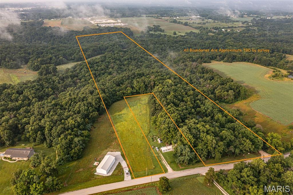 This property includes the home along with an additional 25± acres, offering a rare opportunity to own an expansive tract with endless possibilities. Enjoy the privacy, open space, and
flexibility this property provides—ideal for recreation, farming, hunting, horses, or simply enjoying a peaceful country lifestyle. Whether you're looking for a private retreat, a family
homestead, or an investment with room to grow, this property offers the perfect blend of comfortable living and abundant acreage.

This listing includes MLS #26038967, which is 3 acres with the house.