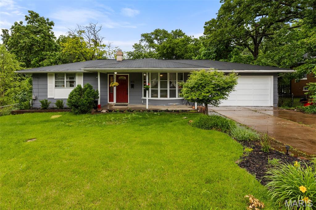 Circa 1964, this 2 bed/2 bath bungalow is deceiving from first glance. The boho-retro vibes greet you as you step into the front door—just the spot for future fondue parties with your vinyl collection spinning in the background. The party will flow seamlessly with the easy single-level living from the dining/greenroom space to the sweet cozy family room connecting directly to open kitchen. 2 bedrooms and a full bath complete this level
But there’s even more downstairs! The mostly finished walkout basement offers incredible flexibility with an unofficial bedroom featuring a walk-in closet, another family room, a bonus room ideal for an office or craft space, plus an additional full bath and tidy laundry/storage area.
Step outside to the huge fenced backyard bursting with untapped potential. Whether you envision gardens, layered patios, a firepit hangout, or play zones-there’s room here to truly create something special...or leave it be and just enjoy your private greenspace The oversized 2-car garage only adds to the possibilities with extra storage and workspace options.
The walkable location shines, especially for those wanting easy access to the sporty side of Webster Groves—just blocks from the rec center with swimming, tennis, pickleball, skating, and more. Foodies rejoice! You are about a 20-minute walk (or a 5 minute drive) to the Crossroads AND Old Orchard districts. Ready to meet your new home? We can’t wait to introduce you!