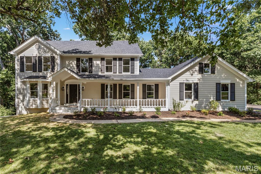 Stunning renovation just complete on the 2 story, 4 bed, 3.5 bath home in the heart of Chesterfield! Almost everything in this home inside and out has been updated! Covered front porch will greet you as you enter. Brand new hardwood floors flowing through entire main level! Updated kitchen features all new cabinets, large center island with bar stool seating, stainless appliances, quartz tops, and tile backsplash! Adjacent large great room offers updated wet bar with quartz, bar stool seating, fireplace, and large bay window overlooking private back yard space! Adjacent screened in porch perfect for that morning cup of coffee! Additional formal living and dining rooms! Main floor laundry! Upstairs boasts a massive primary bedroom suite with its own fireplace, lots of closet space, and fully updated bathroom including new tile floors, new shower with tile surround, new glass shower doors, new tub, and new double bowl vanity with quartz tops! Three additional spacious bedrooms upstairs with updated hall bath boasting new tile floors and tile surround, and new vanity! Lower level is mostly finished, including brand new full bath, large re room with walkout basement, and lots of storage space! Dual zone HVAC! New 200 amp electrical panel and 100 amp subpanel! Newer water heater! Additional features include new premium height baseboards throughout, new light and plumbing fixtures throughout, new door hardware and hinges throughout, new electric panel, updated plumbing, new flooring throughout entire home, brand new concrete garage floor, freshly painted inside and out! And there is more! Exterior offers new architectural roof and new skylights, new upgraded fascia, new gutters, and hardboard siding has been soft washed and freshly painted! New retaining wall around driveway, new driveway asphalt overlay, new garage concrete floor, lots of new landscaping, updated screened in porch with new screens, fixture, and fresh paint! New deck off kitchen and new landing deck off walkout basement! Amazing scenic back yard with so much privacy and wildlife, quiet and scenic setting! Located at the end of a culdesac street with very little traffic! This home is magnificent and has been thoroughly updated from top to bottom, inside and out! Amazing must see opportunity!