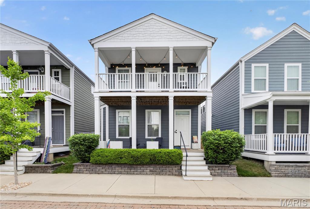 OPEN HOUSE CANCELLED 5/17!
Welcome to 3221 Camp Street! Located on a quiet cobblestone street, offering 1,702 sq ft of thoughtfully designed living space, this upgraded 3-bedroom, 2.5-bath home perfectly blends thoughtful finishes with the unmatched lifestyle of New Town St. Charles.

A picturesque double front porch greets you as you walk up. Step inside to an inviting and efficient main level showcasing rich hand-scraped wood floors, custom white plantation shutters, and an elegant custom hallway hall tree closet. The cozy family room is highlighted by gorgeous custom built-ins, creating a stylish space to relax. The beautifully appointed kitchen features upgraded cabinetry, granite countertops, custom pantry and a glass backsplash.
Upstairs, the primary suite serves as a peaceful retreat, complete with a walk-in closet with closet system and access to your own private second-story covered porch, the ultimate spot to enjoy your morning coffee! The second level also features a versatile loft/flex space, two additional bedrooms, and the incredible convenience of a second-floor laundry room with built-in storage.

The lower level offers excellent potential to expand. It includes an egress window, a sump pump, and a secondary basement laundry area, making it a perfect blank canvas ready for your future finishing touches. An attached 2-car garage provides ample parking and storage. The low-maintenance turf yard means you can spend your weekends enjoying the community rather than doing yard work! 

As a resident of New Town, you have walk-out-your-door access to incredible amenities. Enjoy a resort-style life with sparkling community pools, picturesque lakes, navigable canals for kayaking and water sports, and well-maintained parks. Take a short stroll to local restaurants, coffee shops, the neighborhood grocery store, and the post office. Your weekends will be filled with trips to the vibrant farmer's market, pickleball matches, and live concerts, movies, and festivals at the outdoor New Town Amphitheater.

With easy access to major highways making commuting a breeze, this move-in-ready home is an exceptional opportunity in an unbeatable location. Priced to sell, schedule your showing today!