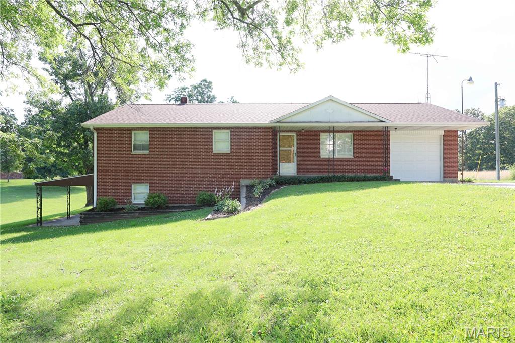 New Listing | Prime Location Just Outside Perryville!

Don't miss this all-brick, 1,308 sq. ft. home situated on 2.3 acres ± just outside of Perryville off Highway 51. This 3-bedroom, 2-bathroom home offers the perfect combination of country living with the convenience of being just minutes from everything Perryville has to offer.

The spacious, level lot provides endless possibilities and is an ideal setting for adding a shop building, extra garage, or simply enjoying the wide-open space.

Recent improvements include a new septic system, newly insulated garage, and a number of additional updates throughout the home. The property is also served by county water, making it both practical and convenient.

If you've been looking for a home with acreage in a highly desirable location, this property checks all the boxes—peaceful surroundings, room to grow, and easy access to shopping, schools, restaurants, and other local amenities.