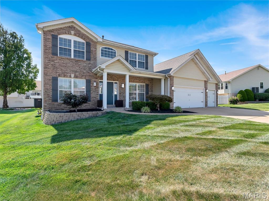 Welcome to this stunning 2-story home offering 4 bedrooms, 3.5 baths, exceptional curb appeal, and a beautifully landscaped setting that truly stands out. From the moment you arrive, you’ll appreciate the inviting exterior, spacious 3-car garage, and private backyard oasis featuring privacy trees surrounding a covered patio perfect for relaxing or entertaining, and a storage shed for added convenience.  Inside, you’ll find a bright and thoughtfully designed floor plan that perfectly balances traditional elegance with everyday functionality. The main level features a formal living room and separate dining room, along with a warm and inviting family room centered around a gas fireplace that flows seamlessly into the spacious eat-in kitchen. The kitchen is equipped with granite countertops, stainless steel appliances, a center island, pantry, and a sunny breakfast room overlooking the backyard. Main-floor laundry, a convenient half bath, and easy access to the patio complete the first floor.  Upstairs, you’ll find four generously sized bedrooms, including a spacious primary suite featuring walk-in closet and a luxurious en-suite bath with dual vanities, a soaking tub, and separate shower. The additional bedrooms offer plenty of space for family, guests, or a home office.  The unfinished lower level is ready for your personal touch with a rough-in for a future bathroom, offering endless possibilities to create additional living space while building equity.  With beautiful landscaping, spacious living areas, abundant natural light, and room to grow, this exceptional home truly has it all. Don’t miss your opportunity to make it yours!
