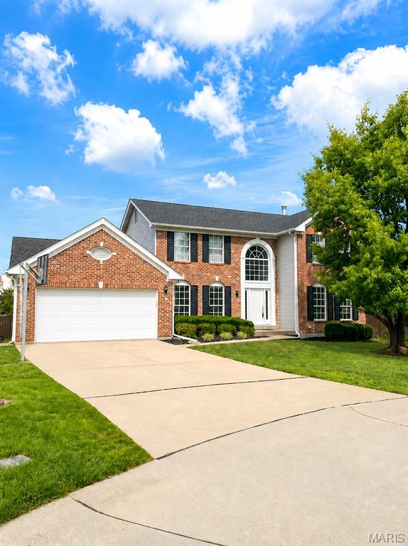 COMING SOON!!! Showings start on June 11! Professional photos will be posted on June 9. Nestled on a private cul-de-sac in the highly sought-after, award-winning Francis Howell School District, this exceptional 4-bedroom, 3.5-bath residence offers an impressive blend of elegance, comfort, and modern sophistication. From the moment you arrive, the stately brick facade and manicured landscaping create a striking first impression. Inside, you'll discover thoughtfully curated living spaces designed for both everyday living and entertaining. The heart of the home is a stunning kitchen with beautiful cabinetry, a stone backsplash, oversized center island, stainless steel appliances, walk-in pantry, planning station, and abundant natural light. The adjoining breakfast room opens seamlessly to an expansive deck, creating the perfect indoor-outdoor flow. The inviting great room showcases hardwood flooring, a dramatic stacked-stone fireplace, recessed lighting, and an atrium door leading to the outdoor living area. A private executive office with hardwood floors provides an ideal work-from-home setting, while the formal dining room offers an elegant space for hosting memorable gatherings. Retreat to the luxurious vaulted primary suite featuring a massive walk-in closet and a spa-inspired bath designed for relaxation. Three additional bedrooms complete the upper level. The finished lower level expands your living space with a spacious recreation room, full bath and sleeping quarters/office, offering flexibility for multigenerational living or visitors. Additional highlights include dual HVAC systems, a 50-gallon water heater, roof replaced in 2025, two laundry areas (main floor and lower level), and exceptional storage. Step outside to enjoy the beautifully landscaped backyard featuring a large, covered deck and a separate grilling terrace—perfect for entertaining, summer evenings, and year-round enjoyment. Combining timeless elegance, modern updates, and an outstanding location, this remarkable home truly offers luxury living at its finest. Close to shopping, dining and schools!  Don't miss out!
