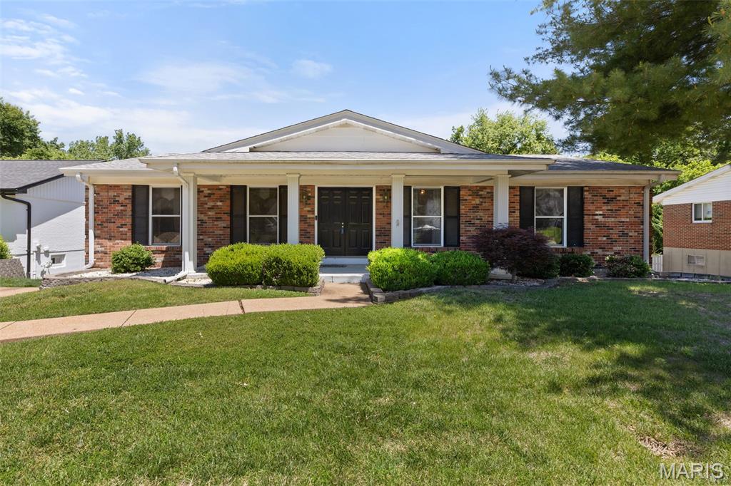 Spacious and full of character, this beautifully maintained all-brick home offers nearly 1,700 square feet of comfortable living space and is conveniently located on a quiet dead-end street with very little traffic. Featuring 3 bedrooms and 2 full baths, this home also includes additional finished living space in the basement complete with another full bath and abundant storage options. Inside, you'll find stylish 42” kitchen cabinets, warm wood flooring, insulated windows, and a walk-in shower in the primary bath. The oversized garage provides plenty of room for vehicles, tools, and hobbies.  With generous space and quality features throughout, this home is ready to welcome its next owner.