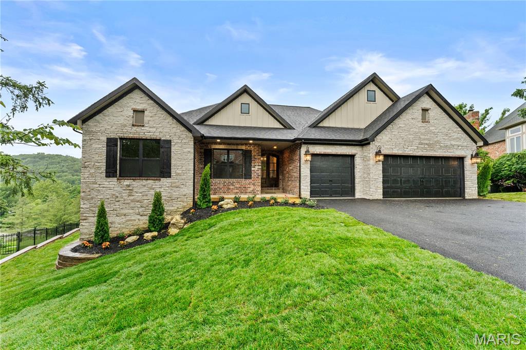 This exceptional ranch residence offers the rare opportunity to enjoy summer in The Country Club of St. Albans. Expansive walls of glass draw in breathtaking views of the golf course, vineyards, and rolling countryside, creating a setting that feels both elevated and deeply connected to nature. A sprawling open floor plan anchors the home, centered around an impressive chef’s kitchen that seamlessly connects to the expansive living room and outdoor spaces beyond. The main level also features a private study, an exceptional primary suite retreat, and two additional bedrooms, all designed with comfort and functionality in mind. The walkout lower level was built for entertaining and extended stays alike, complete with a fireplace, wet bar, expansive recreation spaces, two additional bedrooms, full bath, and abundant storage. Beyond the home, life at The Country Club of St. Albans offers a lifestyle few communities can replicate, with championship golf, clubhouse dining, tennis, fitness amenities, scenic walking trails, and a private setting surrounded by protected natural beauty. Just a short drive from St. Louis, St. Albans delivers a level of serenity, prestige, and everyday resort-style living that is truly unmatched.