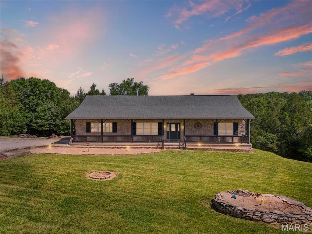 Escape to your own private retreat on 5.54 acres in De Soto! This 3-bedroom, 3-bath home offers the space and serenity you've been searching for. Step inside to discover a comfortable floor plan with two large walk-in closets and plenty of room for everyday living.
Outside is where this property truly shines. Enjoy peaceful mornings on the open front porch and spend evenings unwinding on the impressive covered back porch that stretches the entire length of the home. An attached 2-car garage adds convenience, while the acreage provides endless possibilities for recreation, gardening, animals, or simply enjoying the beauty of country living. Don't miss this opportunity to own your own slice of Missouri countryside!