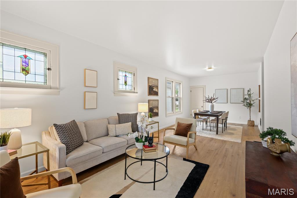 Beautiful fully updated ranch in the heart of Princeton Heights, set on a quiet one-way street. This 2-bedroom, 1-bath charmer sits just minutes from Francis Park, the shops and restaurants along Macklind Avenue, and the popular Southampton and St. Louis Hills dining scene, with quick access to Highway 44 and Ted Drewes for those summer evenings.

Enjoy true peace of mind with a brand-new roof, furnace, AC condenser, and water heater. Start your mornings on the welcoming front porch with a cup of coffee. Step inside to a HUGE living room that flows seamlessly into the dining room, perfect for entertaining. The eat-in kitchen shines with quartz countertops, brand-new soft-close cabinetry, and stainless steel appliances (appliances provided but not shown in photos). Just off the kitchen, a spacious bedroom offers direct access to the backyard. The stylishly updated bathroom features a mid-century vanity with elegant gold touches. Outside, the spacious backyard is ideal for gardening and relaxing. Downstairs, the walk-out basement provides valuable additional living space and flexibility. New flooring throughout ties it all together.

This one truly has it all: updated, move-in ready, and in one of South City's most beloved neighborhoods. Schedule your showing today!