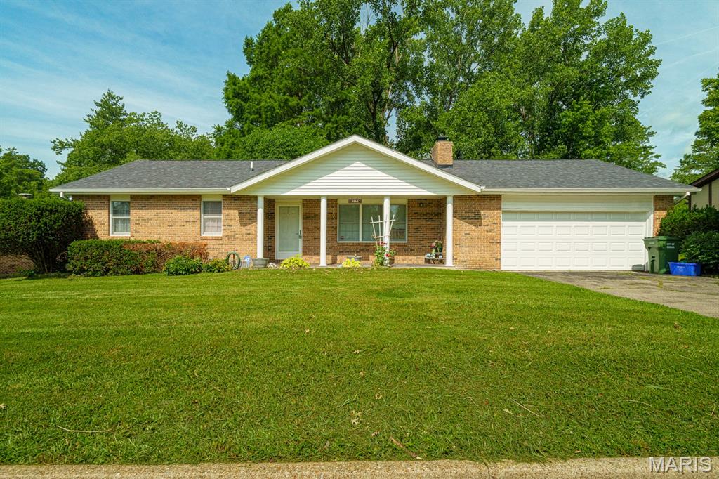 This 3 bedroom/2 bath home is located in a great neighborhood just up the street from a city park! The backyard is fenced and has a storage shed making a great space for pets or children. Inside, the home features a wood-burning fireplace with an insert providing a cozy place for those chilly nights. The primary suite has vinyl flooring and a 3/4 bath with shower while the hall bathroom has a premium walk-in tub providing both  comfort and convenience. The galley kitchen has updated cabinets, a large pantry and a movable oak kitchen island with granite top for extra work space and a great entertainment spot for guests. Located off the dining area, the spacious family room  has access to the fenced portion of the backyard and provides a great second living space. All of this along with a new roof and HVAC both installed in February of 2026 and a spacious garage make this a great place to call home!