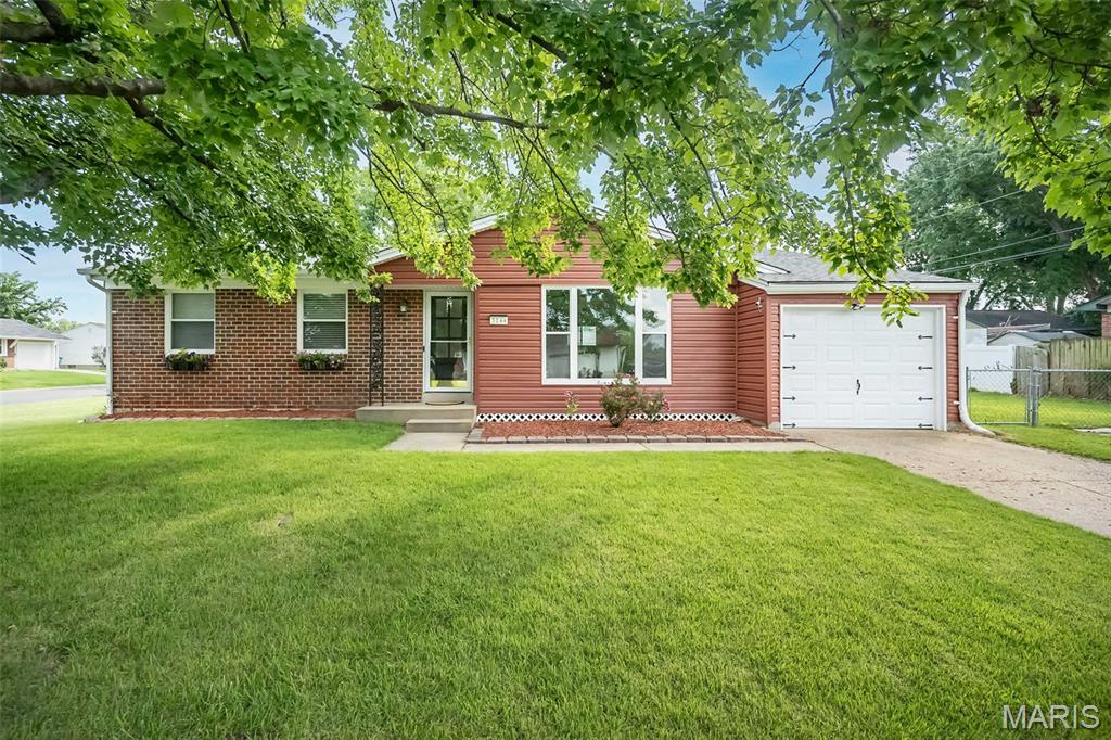 Looking for a home that's equal parts stylish and practical? You've found it! This beautifully updated ranch is bursting with charm from the moment you arrive. Step inside to an inviting open floor plan featuring durable luxury vinyl flooring, amazing natural light, and plenty of room to gather with family and friends. The showstopper kitchen steals the spotlight with custom cabinetry, sleek countertops, stainless steel appliances, eye-catching tile backsplash, gas range, and generous storage—proving you don't have to sacrifice style for affordability! Three comfortable bedrooms and two full baths provide everyday convenience, while the finished lower-level recreation room offers the perfect space for movie nights, game days, a home gym, or playroom. Still need more room? The unfinished portion of the basement is ready for your ideas, whether that's a workshop, storage, or future finished living space. Outside, enjoy a covered patio overlooking the level backyard—ideal for relaxing evenings, weekend BBQs, or letting kids and pets play. Conveniently located with easy access to shopping, dining, parks, and highways, this home is the perfect place to begin your next chapter! Seller is including a one-year home protection plan for added peace of mind. Stylish, affordable, and full of charm—homes like this don't stay available for long!