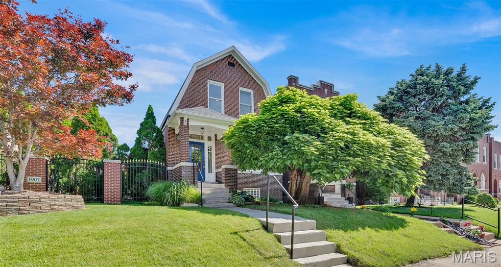 Welcome to this beautifully renovated historic home tucked within the heart of McKinley Heights. Step inside and fall in love with the transom-topped front door, rich architectural character, and the graceful staircase that sets the tone for the home’s timeless appeal. The gourmet kitchen blends classic style with modern convenience, offering crisp white cabinetry, granite counters, stainless appliances, and an adjoining breakfast/dining area perfect for everyday living.
A charming half bath on the main level features a pedestal sink, tile accents, and warm ceramic flooring. Upstairs, two generously sized bedrooms—each with double closets—provide comfortable retreats. The updated full bath impresses with its stylish vanity, tile flooring, and beautifully tiled tub surround.

The walk-up basement expands your possibilities with a rough-in bath, new vinyl windows, and a glass block window—ready for future finishing. Covered front and back porches invite you to unwind outdoors.

Thoughtful updates include a 200-amp electric panel, new gutters and downspouts, 9" main-level baseboards, tuckpointing, fresh paint, updated lighting, and new luxury vinyl plank flooring throughout most of the home.

Historic charm meets modern comfort in this wonderfully updated residence.