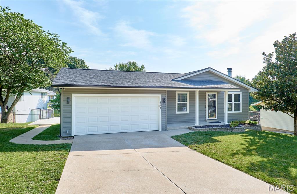 Welcome Home! This well-maintained 3-bedroom, 1.5-bath home offers the perfect blend of comfort, space, and functionality. Step inside to an inviting open-concept main living area featuring abundant natural light, and a cozy fireplace that's perfect for relaxing or entertaining. The kitchen provides plenty of cabinet and counter space, stainless steel appliances, and flows seamlessly into the dining and living areas. Downstairs, you'll find approximately 517 square feet of finished lower-level living space, providing the perfect area for a family room, recreation room, home office, workout space, or whatever best suits your needs. Outside, you'll appreciate the attached 2-car garage, covered front porch, and backyard with a patio that's perfect for grilling, entertaining, or enjoying your morning coffee.

Don't miss the opportunity to make this move-in-ready home your own. Schedule your showing today!