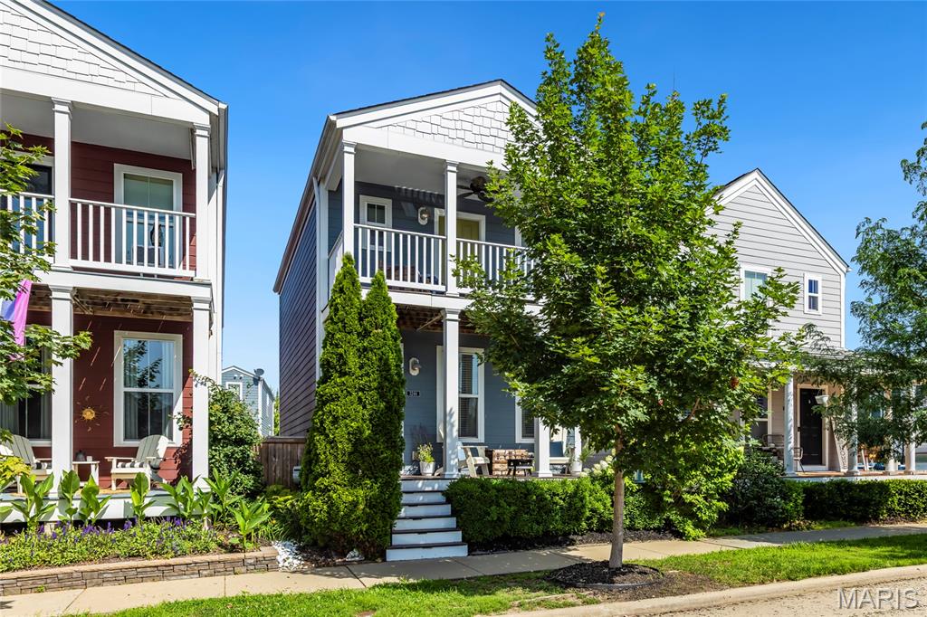 Open Sun, 7/5, 2-4pm. Charming 2-story home with double stacked porches located on a quiet tree-lined street in New Town! This home boasts 3 bedrooms, 3.5 bathrooms, and over 1,500 square feet of living space, including the finished lower level.

Spacious light-filled living room opens to the kitchen boasting 42 inch cabinetry and updated appliances. Convenient powder room completes the main level.

The second floor features fresh paint, newer carpet and the primary bedroom suite with a private porch; as well as an additional bedroom, a full hall bathroom, loft area, and laundry room.

Finished lower level features a large rec room, sleeping area and 3rd full bath. Excellent location – close to highways, restaurants, shops, and walking distance or a short golf cart ride to all that New Town has to offer!
