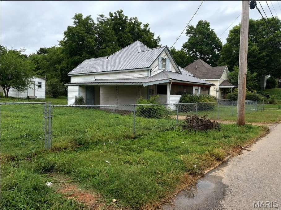 Welcome to this well-maintained 2-bedroom, 1-bath home located on a spacious corner lot in Poplar Bluff. This property features an updated kitchen and bathroom, both remodeled approximately three years ago, along with a newer HVAC system and a roof replaced just two years ago. Additional highlights include a versatile attic space, fenced yard, carport, storage shed, and concrete foundation. Conveniently situated near local shopping, dining, and everyday amenities, this home offers a blend of comfort, functionality, and value for homeowners and investors alike.