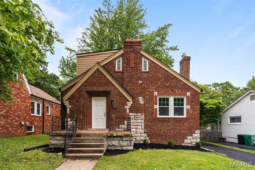 Welcome to this completely renovated brick 1.5-story in the heart of Brentwood! You'll be withing walking distance of Brentwood Schools and Brentwood Promenade, with quick access to highways, nearby restaurants and shops, Brentwood Community Center, Library, and Park. Charming brick and stone exterior, new landscaping, and a new driveway make for great curb appeal. Inside, the foyer opens to the bright living room featuring a stone-surround gas fireplace, archways, built in bookshelves, and new flooring that continues into the dining room and throughout the main level. The kitchen boasts 42" white cabinets with crown molding, quartz counters, stainless steel appliances, black fixtures and a timeless white subway-tile backsplash. There are two spacious bedrooms on the main floor, plus an updated bathroom with gleaming tile floors, brushed gold fixtures and lighting, and a tile-surround tub. Upstairs are two more bedrooms with walk-in closets and a bathroom with gorgeous tile-surround step-in shower, dual sink vanity, and beautiful tile floors. You'll have plenty of storage space in the walk-out basement and detached one-car garage. Enjoy grilling with friends and family on the new patio overlooking the fenced backyard, shaded by large trees. This lovely home in a great location is one you won't want to miss!