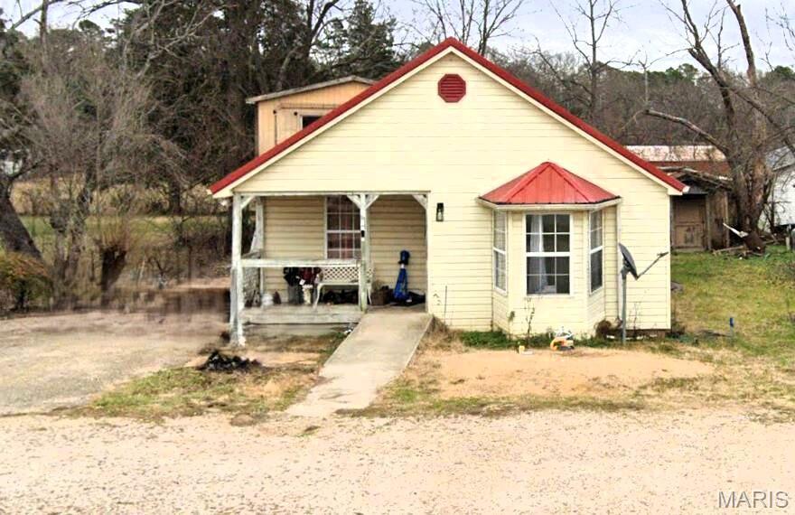 Listed at $69,900- Located in Winona, MO This home offers the perfect balance of convenience, charm and accessible to schools, grocery stores and downtown Winona. Home has two bedrooms, one bath, central heat/air, newer laminate flooring, large kitchen with lots of cabinets and dining room for entertaining. Home needs a little TLC. Outside the home has a spacious covered back deck, metal roof and large lot. One car detached garage either needs to be torn down, or you can have a project and fix it up. Does get water in it during rains. Located in the Ozarks of southern Missouri the town and surrounding towns feature rolling hills, crystal-clear rivers, Rocky Falls, and the National Scenic Riverways. A short drive to the Jacks Fork and Current River offers plenty of opportunities for fishing, floating, canoeing, kayaking, hiking and relaxing.