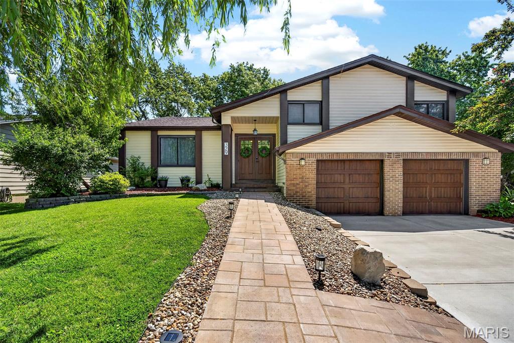 St. Peters Gem – 5 Beds, 3 Baths, Multi-Generational Living!

This one-of-a-kind home offers nearly 3,000 sq ft of beautifully remodeled space with 5 bedrooms, 3 full baths, and a 2-car garage with marble epoxy floors. Perfect for multi-generational living, it features 2 kitchens, 2 laundry areas (including mother-in-law quarters in the finished lower level), and an on-demand hot water heater.

The walkout basement is ideal for entertaining, with a wet bar, sitting room overlooking the backyard, 2 bedrooms, and a full bath. The backyard includes a pool with new liner, hot tub, semi-basketball court, patio, deck, fire pit, outdoor kitchen (without running water), a 2-story shed, and an additional utility shed.

Inside, the entry foyer has a slate and wood floor, leading to a sitting room. Vaulted ceilings, wood floors, and an open floor plan showcase the spacious living room with gas fireplace and crown molding. The kitchen boasts stone tile floors, custom cabinetry with under-cabinet lighting, black stainless steel appliances, breakfast bar, pantry, backsplash, floating shelves, and an eat-in dining area or bonus dining room. Another bonus room features vaulted ceilings, stone tile, built-in secretary desk, closets, and many windows.

The primary suite has French door access, recessed lighting, wood floors, and a barn-door bathroom with separate tub and shower. Additional bedrooms include a dressing-room/closet conversion with laundry, while the hall bath features a jetted tub. The 3rd bedroom has chair rail and wainscoting.

Other upgrades: new roof, many new windows, 3-year-old appliances, attic fan & storage, urinal & toilet in lower-level bath, sprinkler system, ice maker & beverage cooler, fenced yard, and excellent curb appeal. Located in Francis Howell School District near St. Charles Community College, shopping, dining, parks, and schools.